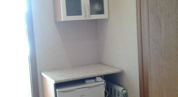 Фото номера Трехместный номер с террасой Гостиница Guest House Livadiya Vinogradnaya г. Ливадия 9