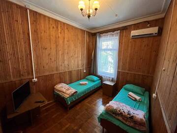 Фото номера Трехместный номер Гостевой дом Югославия г. Ливадия 5